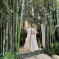 letni komplet damski bambusowy muślin naturalna tkanina przewiewny zestaw oversize top wiązany szyja plecy spodnie półkole przykrócone nogawki wakacyjny styl boho slow fashion resortowy look komfort elegancja lato premium jakość