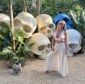 letni komplet damski bambusowy muślin naturalna tkanina przewiewny zestaw oversize top wiązany szyja plecy spodnie półkole przykrócone nogawki wakacyjny styl boho slow fashion resortowy look komfort elegancja lato premium jakość