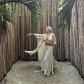 letni komplet damski bambusowy muślin naturalna tkanina przewiewny zestaw oversize top wiązany szyja plecy spodnie półkole przykrócone nogawki wakacyjny styl boho slow fashion resortowy look komfort elegancja lato premium jakość