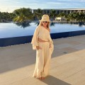 SORA, letni zestaw, oversize top, szerokie spodnie, wysoki stan, kieszenie, naturalna tkanina, przewiewność, minimalistyczny styl, wakacyjna moda, komfort noszenia, elegancja, kobiecość, boho look