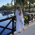 komplet letni bambusowy muślin sukienka kimono koszula maxi top wiązany spodnie szerokie resort wear boho naturalna tkanina przewiewna odzież wakacyjna plażowa styl minimalistyczny elegancki oversize lekkość komfort podróże lato piaskowy beż moda damska